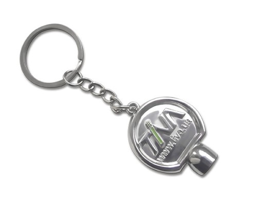 Брелок металевий нестандартної форми новий