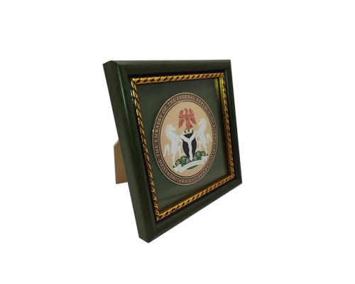 Медаль травлена в рамці 